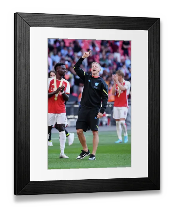Framed Print : Zinchenko's Emotional Victory: Arsenal's Community Shield Triumph over Manchester City