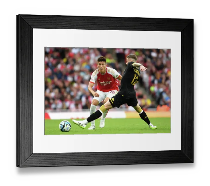 Framed Print : Arsenal vs AS Monaco: Emirates Cup Clash - Tomiyasu vs Caio Henrique