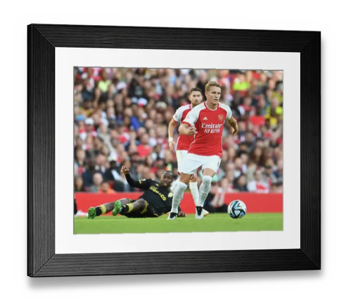 Framed Print : Arsenal's Martin Odegaard Shines in Emirates Cup Clash Against AS Monaco Framed Print : Arsenal's Martin Odegaard Shines in Emirates Cup Clash Against AS Monaco