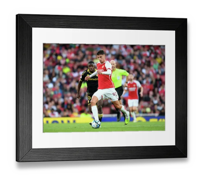 Framed Print : Arsenal's Kai Havertz Faces Off Against AS Monaco's Eliot Matazo in 2023-24 Emirates Cup Clash