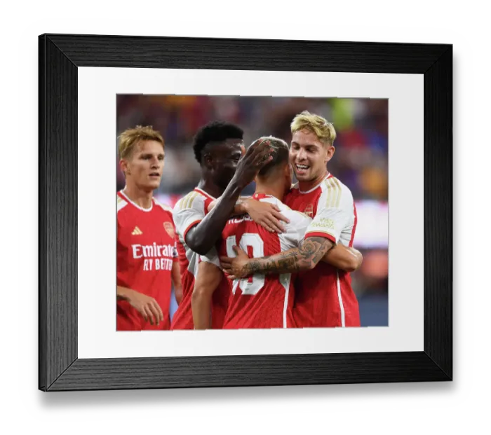 Framed Print : Arsenal's Pre-Season Triumph: Trossard's Hat-Trick Defeats Barcelona (2023-24)