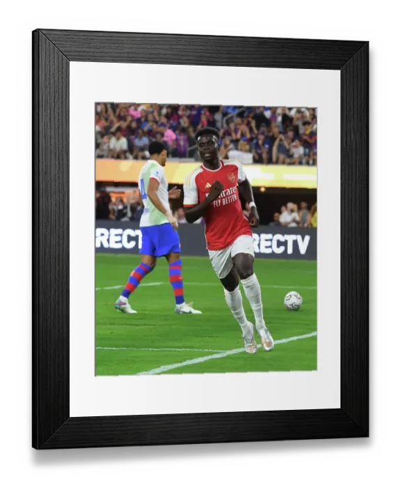 Framed Print : Bukayo Saka Scores the Opener: Arsenal Takes the Lead Against FC Barcelona at SoFi Stadium (2023)