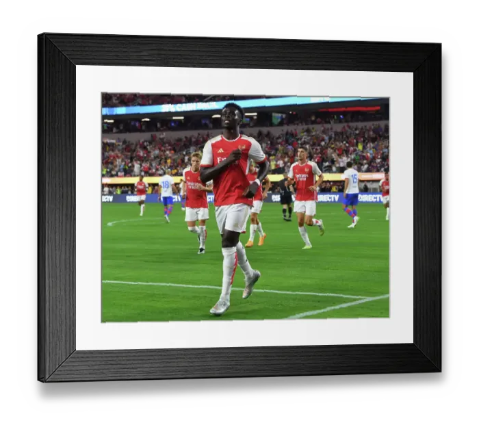 Framed Print : Arsenal vs. FC Barcelona: Bukayo Saka Scores First Goal in Pre-Season Friendly at SoFi Stadium (2023) Framed Print : Arsenal vs. FC Barcelona: Bukayo Saka Scores First Goal in Pre-Season Friendly at SoFi Stadium (2023)