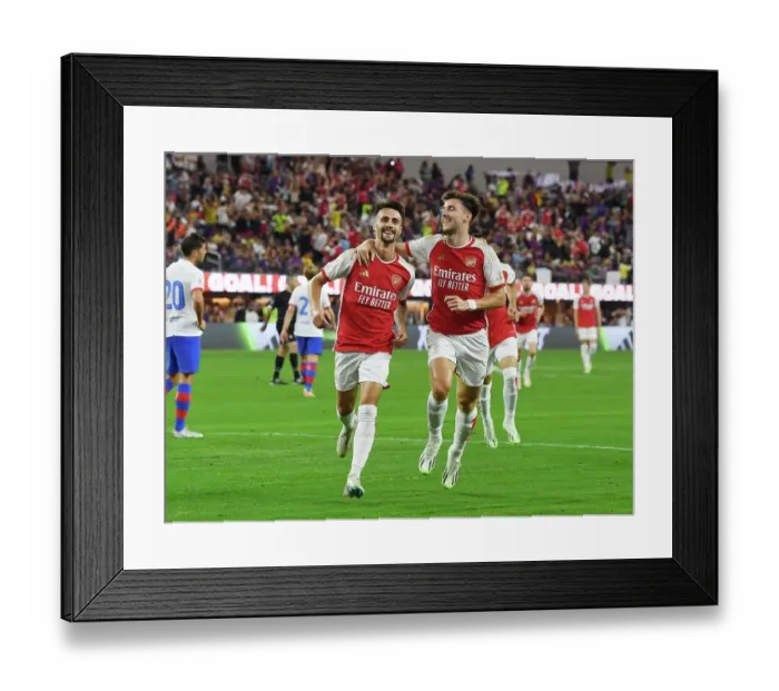 Framed Print : Arsenal's Five-Goal Blitz: Fabio Vieira and Kieran Tierney Celebrate Against FC Barcelona in Pre-Season Friendly
