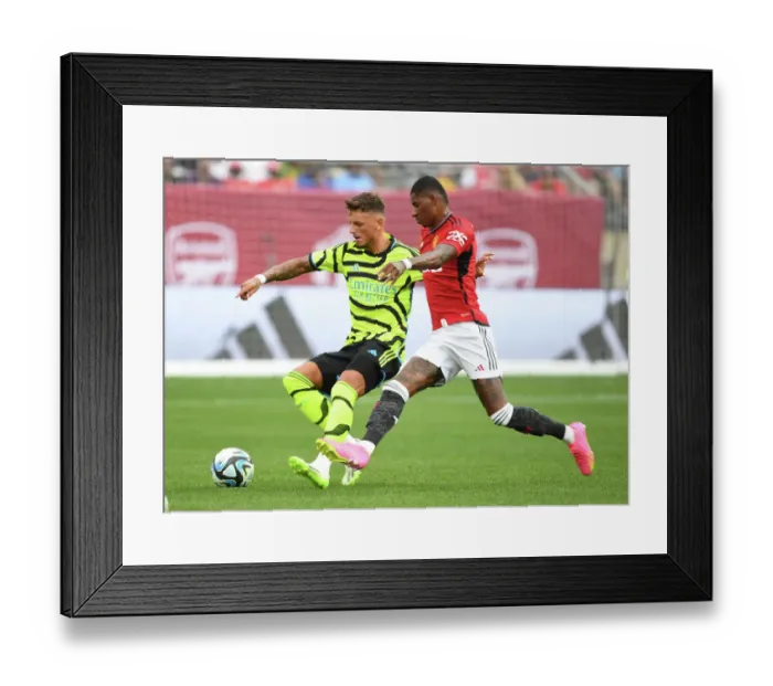 Framed Print : Arsenal's Ben White Outmaneuvers Manchester United's Marcus Rashford in Pre-Season Clash Framed Print : Arsenal's Ben White Outmaneuvers Manchester United's Marcus Rashford in Pre-Season Clash