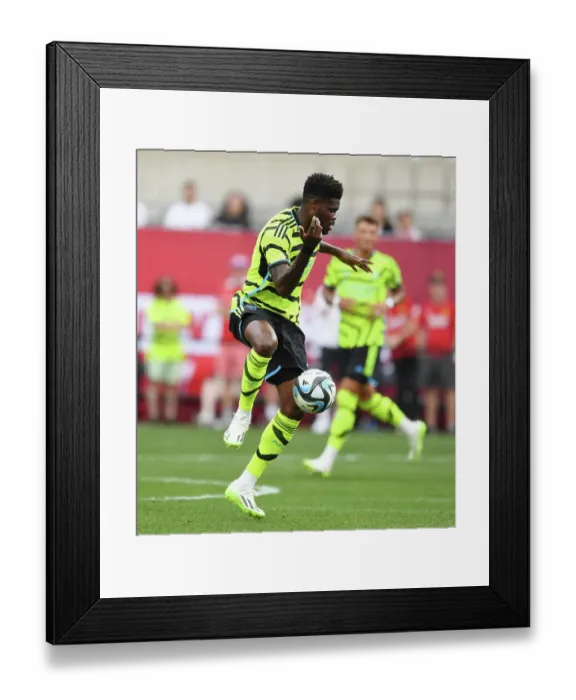 Framed Print : Arsenal's Thomas Partey Faces Manchester United in Pre-Season Friendly, 2023-24