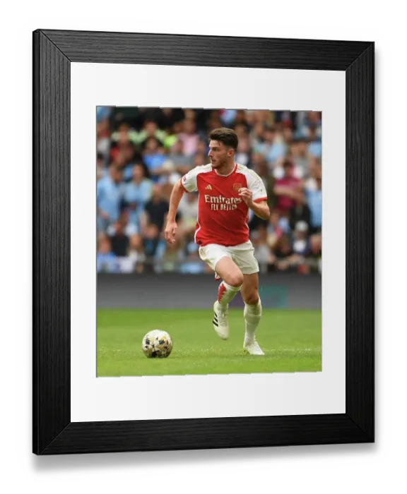 Framed Print : Arsenal's Declan Rice Goes Head-to-Head with Manchester City in 2023-24 FA Community Shield Framed Print : Arsenal's Declan Rice Goes Head-to-Head with Manchester City in 2023-24 FA Community Shield