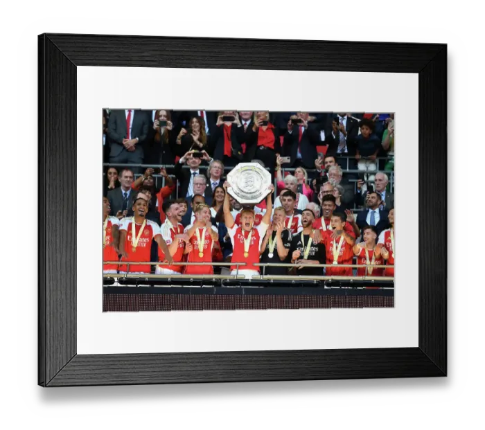 Framed Print : Arsenal: Martin Odegaard Lifts the Community Shield Trophy (2023-24) Framed Print : Arsenal: Martin Odegaard Lifts the Community Shield Trophy (2023-24)