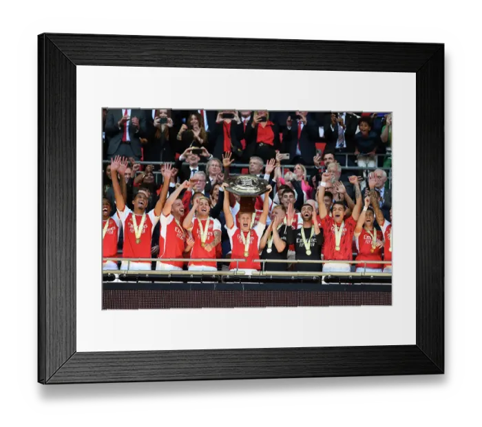 Framed Print : Arsenal Claim Community Shield: Martin Odegaard Lifts the Trophy Framed Print : Arsenal Claim Community Shield: Martin Odegaard Lifts the Trophy