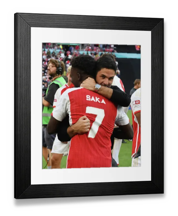 Framed Print : Arsenal's Mikel Arteta and Bukayo Saka Celebrate FA Community Shield Victory over Manchester City Framed Print : Arsenal's Mikel Arteta and Bukayo Saka Celebrate FA Community Shield Victory over Manchester City