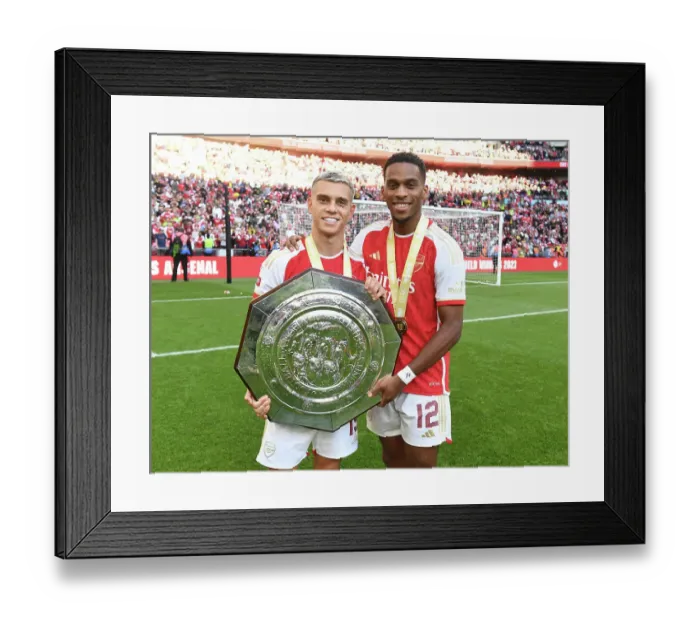 Framed Print : Arsenal's Trossard and Timber Celebrate Community Shield Victory over Manchester City