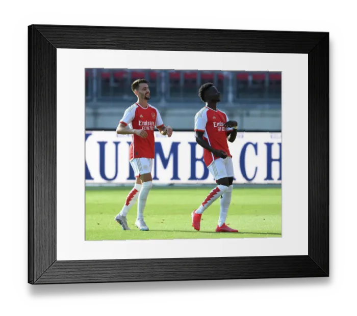 Framed Print : Arsenal's Bukayo Saka and Fabio Vieira Celebrate Goal in Nuremberg Friendly, 2023 Framed Print : Arsenal's Bukayo Saka and Fabio Vieira Celebrate Goal in Nuremberg Friendly, 2023