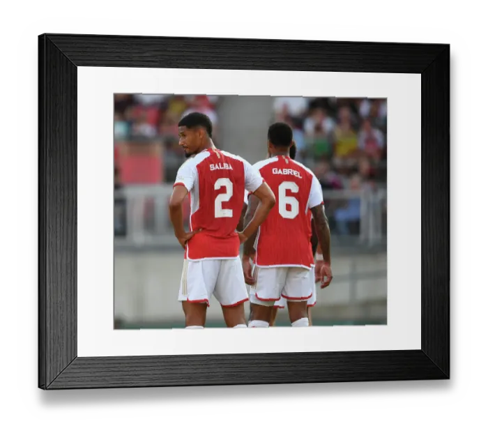 Framed Print : Arsenal's Saliba and Gabriel Face Off in Pre-Season Friendly against FC Nurnberg Framed Print : Arsenal's Saliba and Gabriel Face Off in Pre-Season Friendly against FC Nurnberg