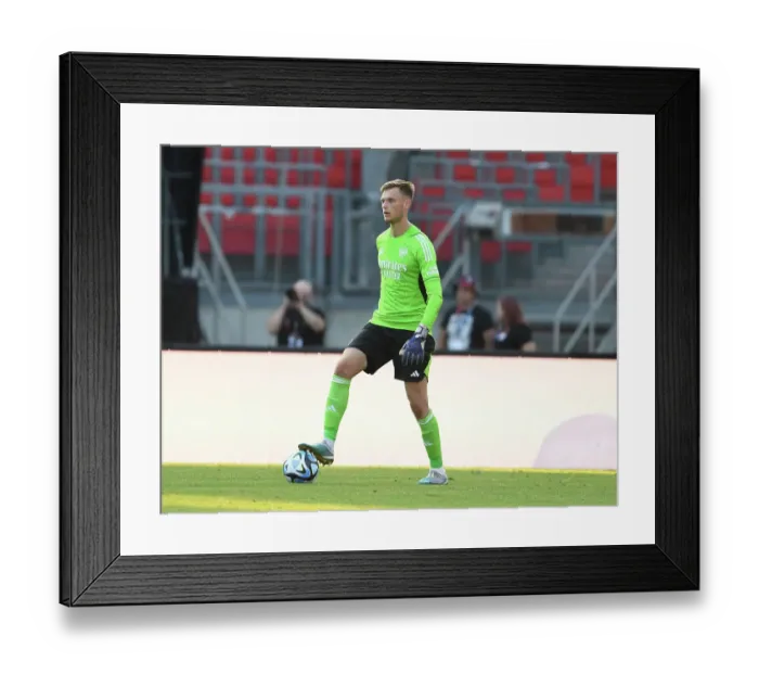 Framed Print : Arsenal's Karl Hein in Action against FC Nurnberg during Pre-Season Friendly, July 2023