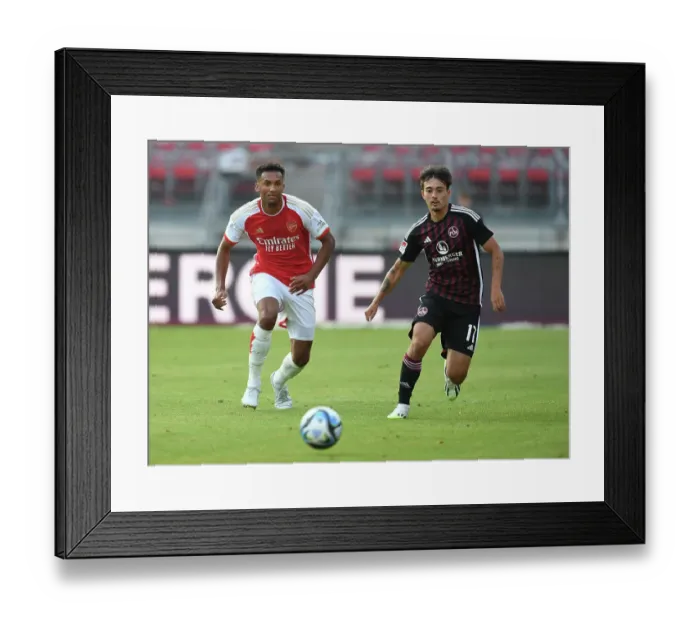 Framed Print : Arsenal's Auston Trusty Clashes with FC Nurnberg in Pre-Season Battle Framed Print : Arsenal's Auston Trusty Clashes with FC Nurnberg in Pre-Season Battle
