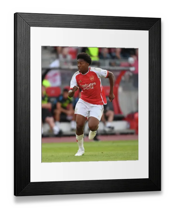 Framed Print : Arsenal FC Training: Myles Lewis-Skelly Shines in Nuremberg