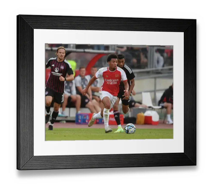 Framed Print : Arsenal's Ethan Nwaneri Shines in Pre-Season Victory Over FC Nurnberg