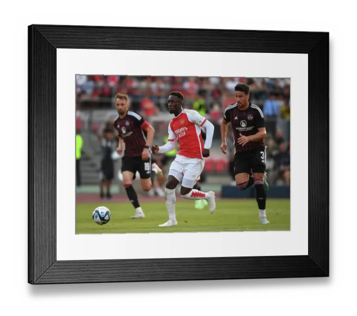 Framed Print : Arsenal's Flo Balogun Shines in Pre-Season Victory over Nuremberg Framed Print : Arsenal's Flo Balogun Shines in Pre-Season Victory over Nuremberg