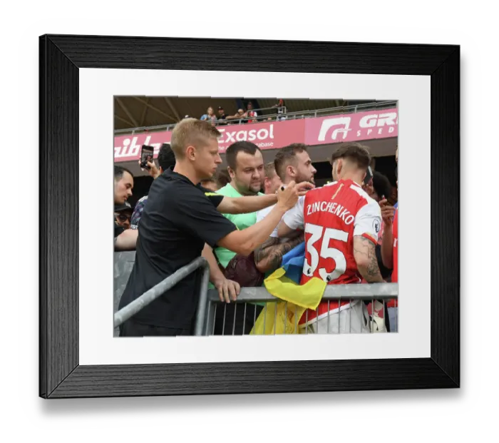 Framed Print : Arsenal's Oleksandr Zinchenko Connects with Fans Ahead of Nuremberg Pre-Season Friendly Framed Print : Arsenal's Oleksandr Zinchenko Connects with Fans Ahead of Nuremberg Pre-Season Friendly