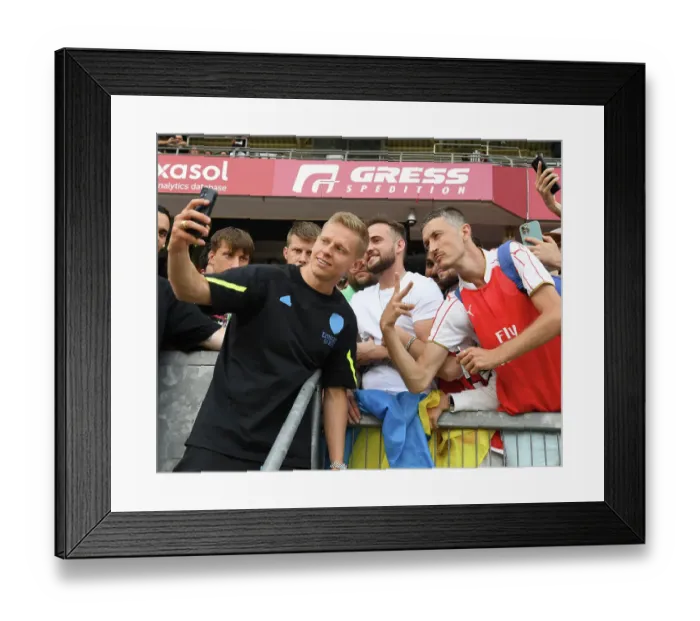 Framed Print : Arsenal's Oleksandr Zinchenko Interacts with Fans Before Nuremberg Pre-Season Friendly Framed Print : Arsenal's Oleksandr Zinchenko Interacts with Fans Before Nuremberg Pre-Season Friendly