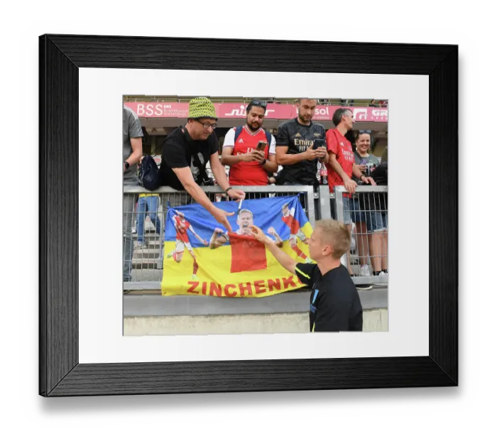 Framed Print : Arsenal's Oleksandr Zinchenko Engages with Fans before Nuremberg Pre-Season Friendly Framed Print : Arsenal's Oleksandr Zinchenko Engages with Fans before Nuremberg Pre-Season Friendly