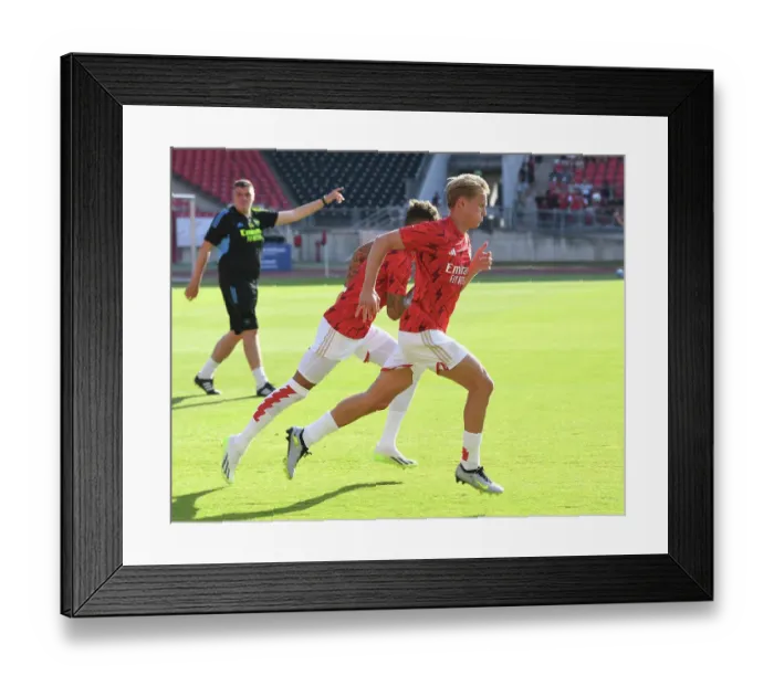 Framed Print : Martin Odegaard Readies for Arsenal's Pre-Season Clash Against Nuremberg