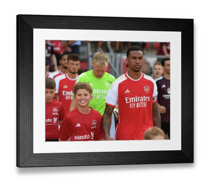 Framed Print : Arsenal's Pre-Season Kickoff: Gabriel Leads the Team Out Against FC Nurnberg, Germany (2023)