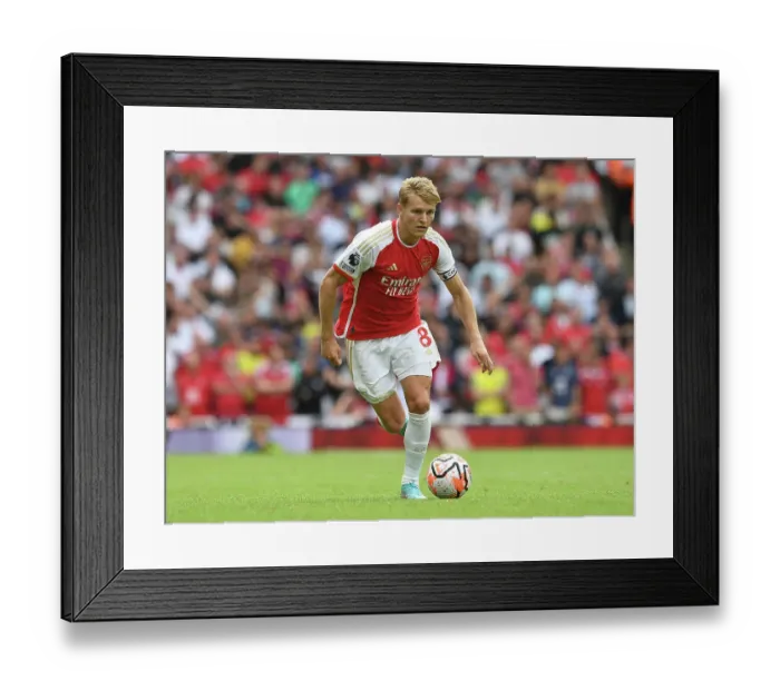 Framed Print : Martin Odegaard Shines: Arsenal Kicks Off 2023-24 Premier League Season with Victory over Nottingham Forest