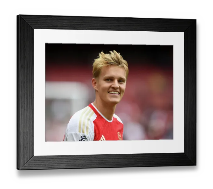 Framed Print : Arsenal's Victory: Martin Ødegaard Reacts to Arsenal FC's Win Against Nottingham Forest (2023-24)