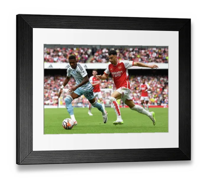 Framed Print : Martinelli vs. Danilo: Intense Battle in Arsenal's 2023-24 Premier League Opener