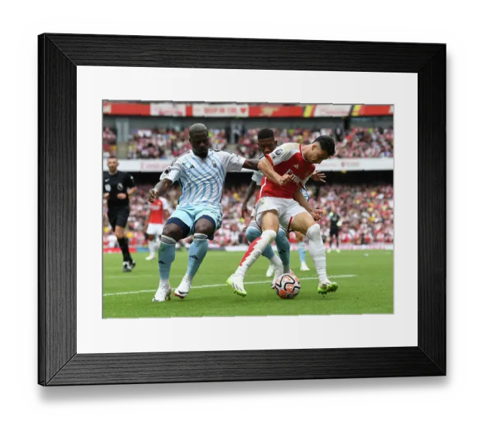 Framed Print : Martinelli Stands Firm: Arsenal's Battle with Forest's Aurier and Danilo (2023-24 Premier League)