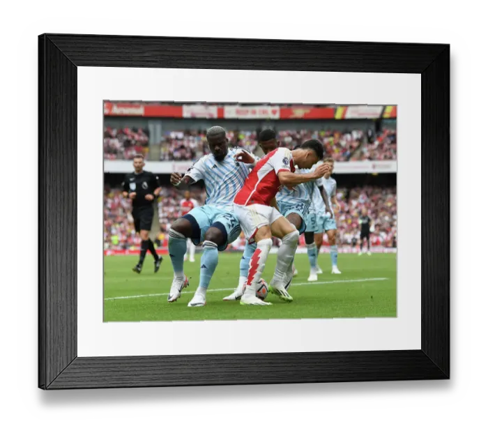 Framed Print : Martinelli's Determined Standoff: Arsenal vs. Forest Clash (2023-24 Premier League) - Martinelli vs Aurier & Danilo Framed Print : Martinelli's Determined Standoff: Arsenal vs. Forest Clash (2023-24 Premier League) - Martinelli vs Aurier & Danilo