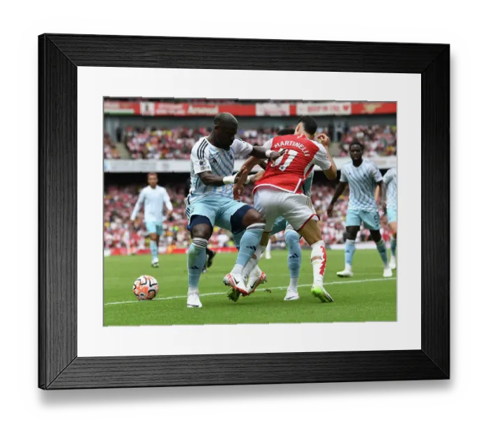 Framed Print : Arsenal's Martinelli Clashes with Forest's Aurier and Danilo in 2023-24 Premier League Showdown