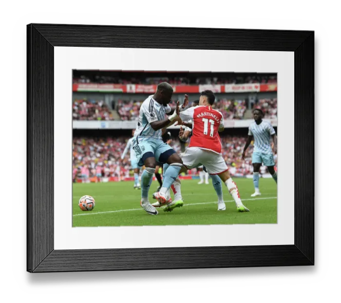 Framed Print : Martinelli Stands Firm: Arsenal's Battle with Forest's Aurier and Danilo (2023-24 Premier League) Framed Print : Martinelli Stands Firm: Arsenal's Battle with Forest's Aurier and Danilo (2023-24 Premier League)