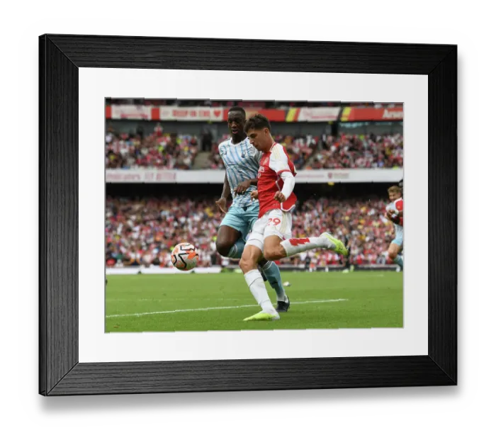 Framed Print : Arsenal vs. Nottingham Forest: Kai Havertz Clash with Willy Boly in 2023-24 Premier League Framed Print : Arsenal vs. Nottingham Forest: Kai Havertz Clash with Willy Boly in 2023-24 Premier League