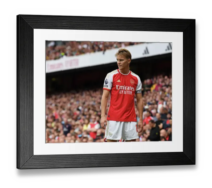 Framed Print : Martin Odegaard's Debut: Arsenal Kicks Off 2023-24 Premier League with Dominant Win over Nottingham Forest