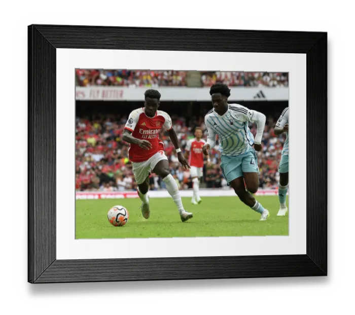 Framed Print : Saka vs. Aina: Intense Face-Off in Arsenal's 2023-24 Premier League Clash Against Nottingham Forest Framed Print : Saka vs. Aina: Intense Face-Off in Arsenal's 2023-24 Premier League Clash Against Nottingham Forest