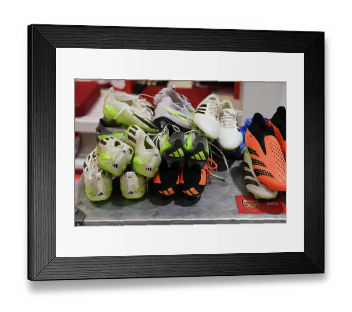 Framed Print : Arsenal Dressing Room: A Glimpse into the Players Boots before Arsenal v Nottingham Forest (2023-24)