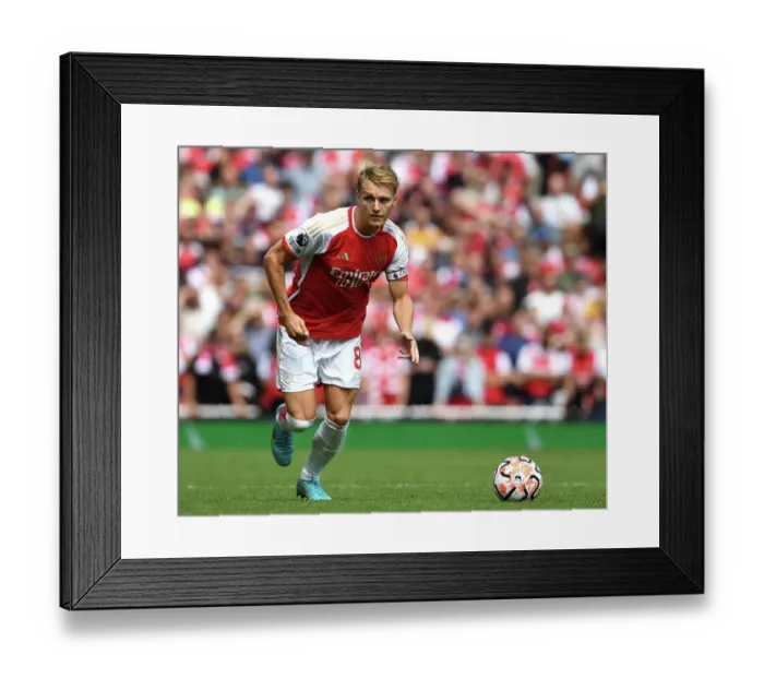 Framed Print : Arsenal's Odegaard Dashes Through Emirates: Arsenal vs. Nottingham Forest (2023-24) Framed Print : Arsenal's Odegaard Dashes Through Emirates: Arsenal vs. Nottingham Forest (2023-24)