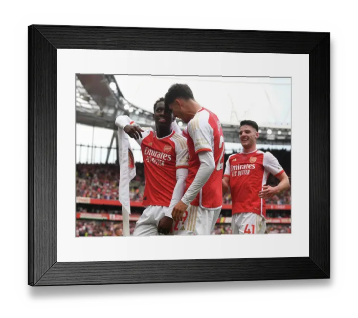 Framed Print : Arsenal's Nketiah and Havertz Celebrate First Goals in Premier League Debut Win