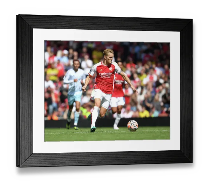 Framed Print : Arsenal's Martin Odegaard Shines in Premier League Clash Against Nottingham Forest (2023-24)