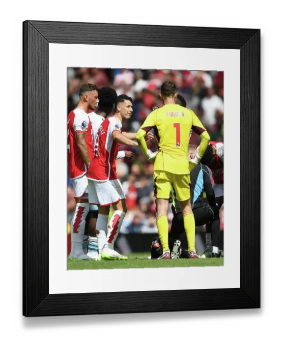 Framed Print : Arsenal's Martinelli Engages With Nottingham Forest's Turner During Premier League Clash (2023-24)