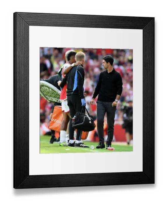 Framed Print : Arsenal's Jurrien Timber Sustains Injury in Arsenal FC vs Nottingham Forest (2023-24)