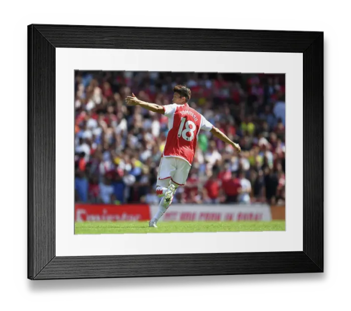 Framed Print : Arsenal's Tomiyasu in Action against Nottingham Forest (2023-24 Premier League)