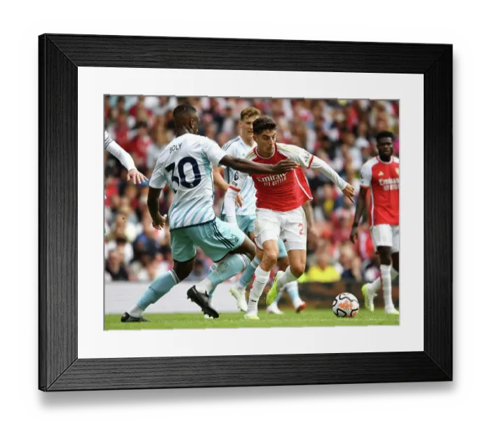 Framed Print : Arsenal's Kai Havertz Fends Off Nottingham Forest's Willy Boly in 2023-24 Premier League Clash Framed Print : Arsenal's Kai Havertz Fends Off Nottingham Forest's Willy Boly in 2023-24 Premier League Clash