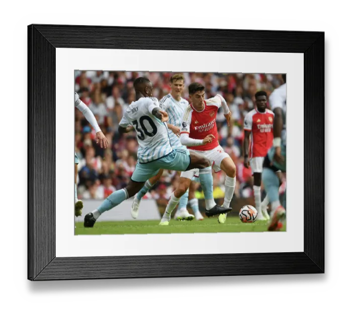 Framed Print : Arsenal's Kai Havertz Outmaneuvers Nottingham Forest's Willy Boly in 2023-24 Premier League Clash Framed Print : Arsenal's Kai Havertz Outmaneuvers Nottingham Forest's Willy Boly in 2023-24 Premier League Clash