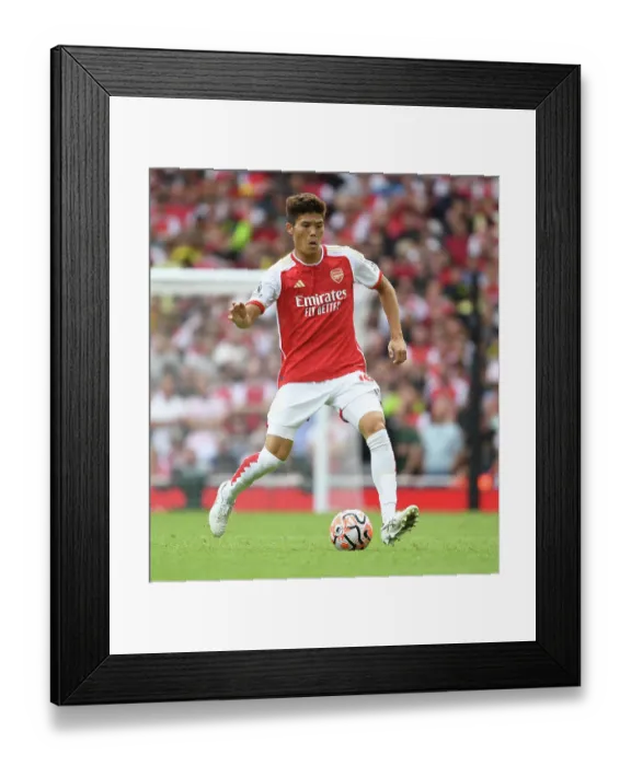 Framed Print : Arsenal's Tomiyasu in Action: 2023-24 Premier League - Arsenal vs. Nottingham Forest