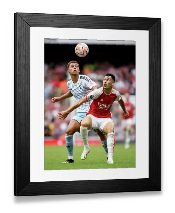 Framed Print : Martinelli vs. Johnson: A Battle for Possession in the Arsenal vs. Nottingham Forest Premier League Clash (2023-24) Framed Print : Martinelli vs. Johnson: A Battle for Possession in the Arsenal vs. Nottingham Forest Premier League Clash (2023-24)