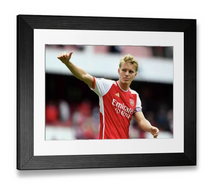 Framed Print : Arsenal's Victory: Odegaard Acknowledges Fans After Arsenal v Nottingham Forest (2023-24) Framed Print : Arsenal's Victory: Odegaard Acknowledges Fans After Arsenal v Nottingham Forest (2023-24)