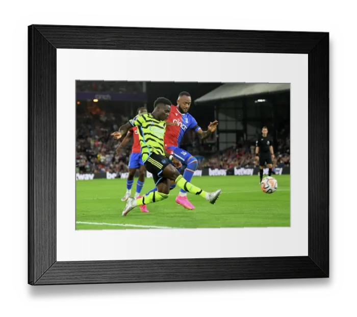 Framed Print : Bukayo Saka Faces Pressure from Jordan Ayew in Crystal Palace vs Arsenal Premier League Clash (2023-24) Framed Print : Bukayo Saka Faces Pressure from Jordan Ayew in Crystal Palace vs Arsenal Premier League Clash (2023-24)